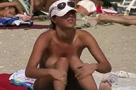 Diminutive love melons sun bathing on beach