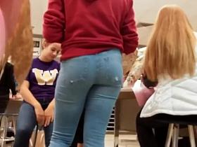 Sexy ass of a schoolgirl in jeans