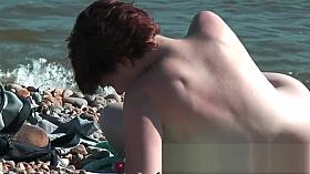 Chick on a nudist beach tanning and bending a nudist beach v