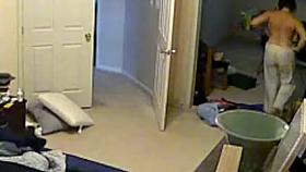 Wife undressing in the bedroom