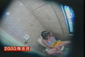 Girl setting nude ass on toilet bowl and masturbating on cam