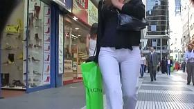 A fan of sexy ass voyeur films the hot butts in white pants