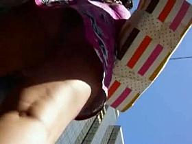 Cute brunette babe in wind blowing up skirt vids