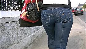 Candid blonde in tight jeans and boots