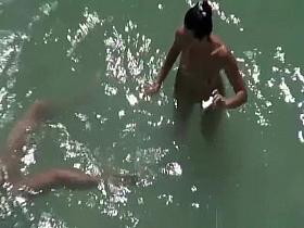 Nude woman takes pictures of her naked man