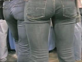 A brunette with huge boobs picks her nose in public