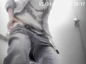 Asian woman spied in public toilet