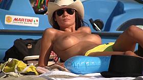 sweet busty brunette on the beach