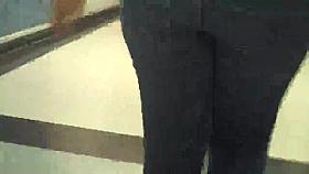 Big butt in jeans parading her ass round