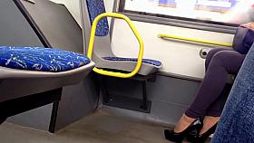 Sexy black highheels in the bus