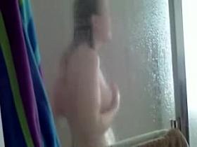 Beauty spied thru the shower room window on the cam