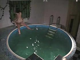 Handjob and sex with skinny brunette in the pool