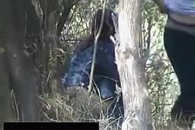 Curly woman took a wizz in the nature