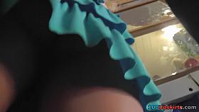 Peek up her tiered green petticoat