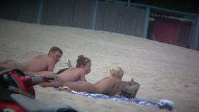 Beach spy voyeur captures two friends sunbathing topless