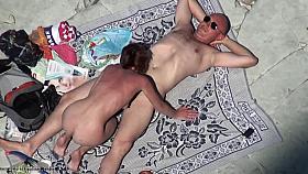 Mature suck cock at the nude beach