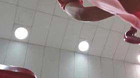 Blonde white Milf in a pink transparent skirt and blue thong