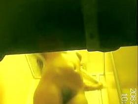 Athletic woman with nice cunt changing in change room