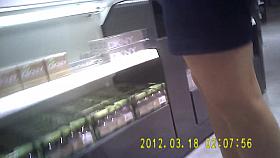 Store girl in shiny tan pantyhose and tight skirt