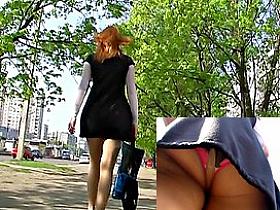Redhead upskirt on a bus