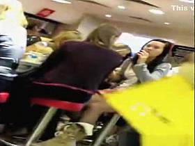 Girl in pantyhose at a scnack bar