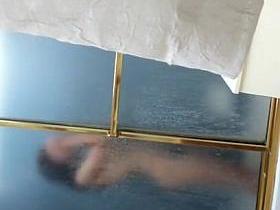 Dark haired girl in the shower sexy naked body view