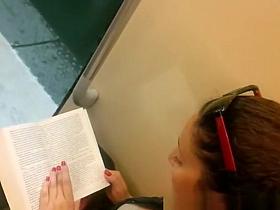 Down blouse in chick reading a book