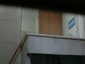 Hidden bathroom video of an Asian babe washing her hands after pissing