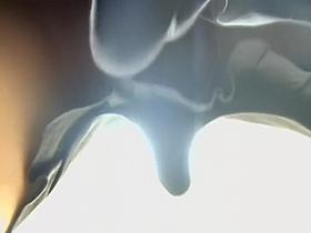 Friendly Asian gal keeps smiling while her cleavage is totally revealed