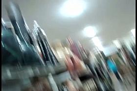 Blonde MILF followed by an upskirt voyeur