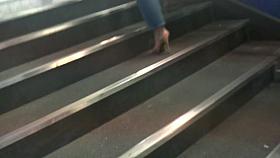 MILF in golden high heels