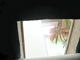 Careful voyeur spied a showering woman