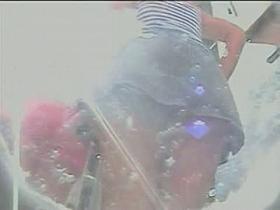 A sexy woman in a jeans one piece upskirt voyeur video