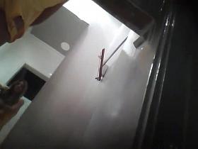 Cute changing room girl looks erotic shot from behind