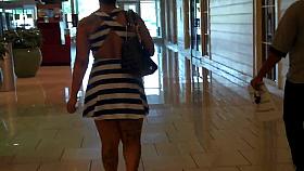 Stuck Up Tatooed Fine Ass Redbone In Short Skirt.