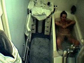 Wife spied in bathtub relaxing