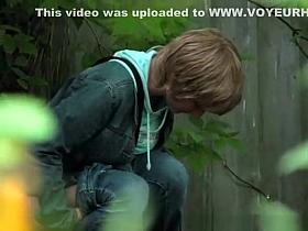 Short hair blonde caught peeing outdoors