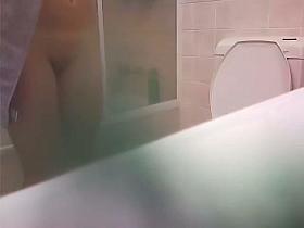 Shower room hidden cam records babe washing and toweling