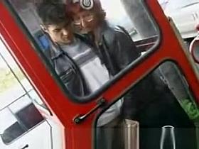 Hand job in phone booth