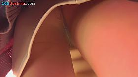 Upskirts in public shows brunette in pretty pantyhose