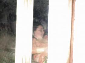 Female spied masturbating through the window of her bedroom