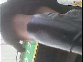 Up skirt enthusiast preys on a hot babe in leather boots