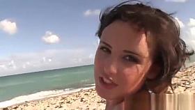 Hot young brunette gets very horny at the nude beach