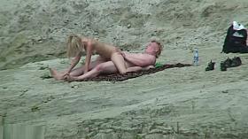 Voyeur spycam on the beach