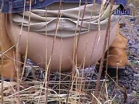 Disgusting Jap whore crapping and pissing in the open