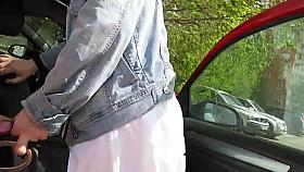 Girl in stockings near a car