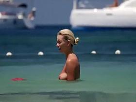 Nice tits blonde topless playing racket ball