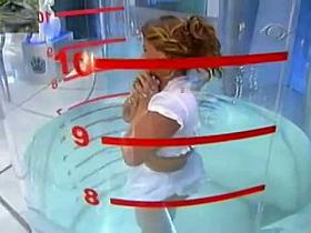 Bubble butt brunette makes upskirt magic on TV