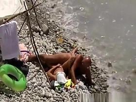 Bald nudist man fucks wife next to water