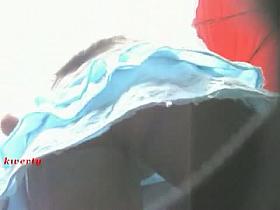 Brunette girl in a blue one piece upskirt voyeur video
